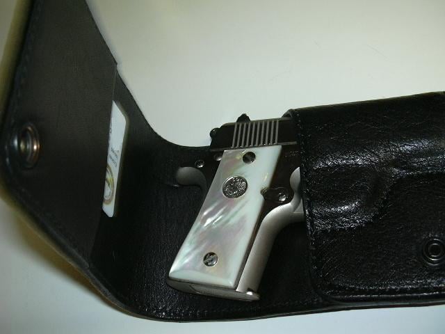 Scorpion wallet holster by Ron Graham, done in Ostrich