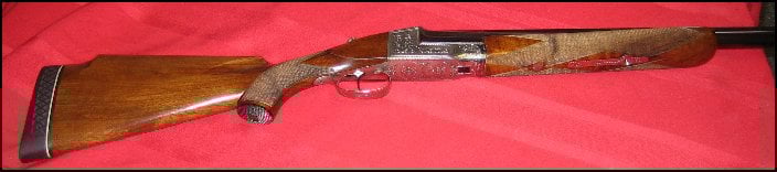 Abercrombie and Fitch 12 gauge shotgun, close up of forearm