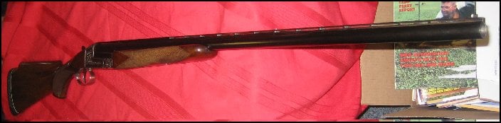 Abercrombie and Fitch 12 gauge shotgun, close up of forearm
