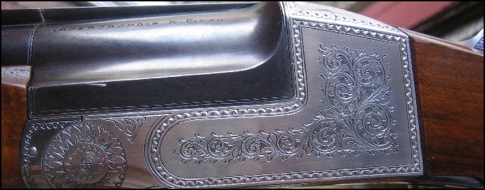 Abercrombie and Fitch 12 gauge shotgun, close up of forearm