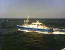 Pilot boat running through the Atlantic near the American Eagle