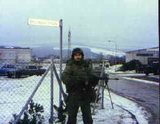 Mike Boyle standing watch on a street corner