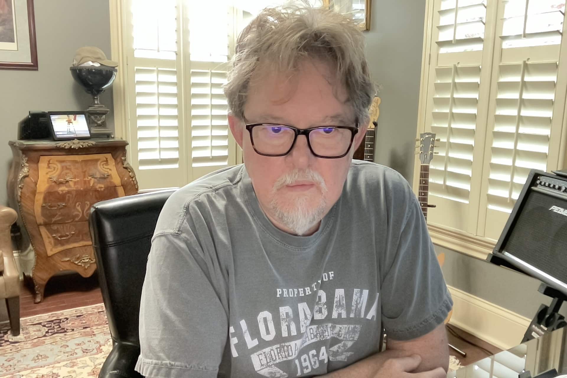 Greg Cook at his desk during the 2026 Gun Collectors Club redesign