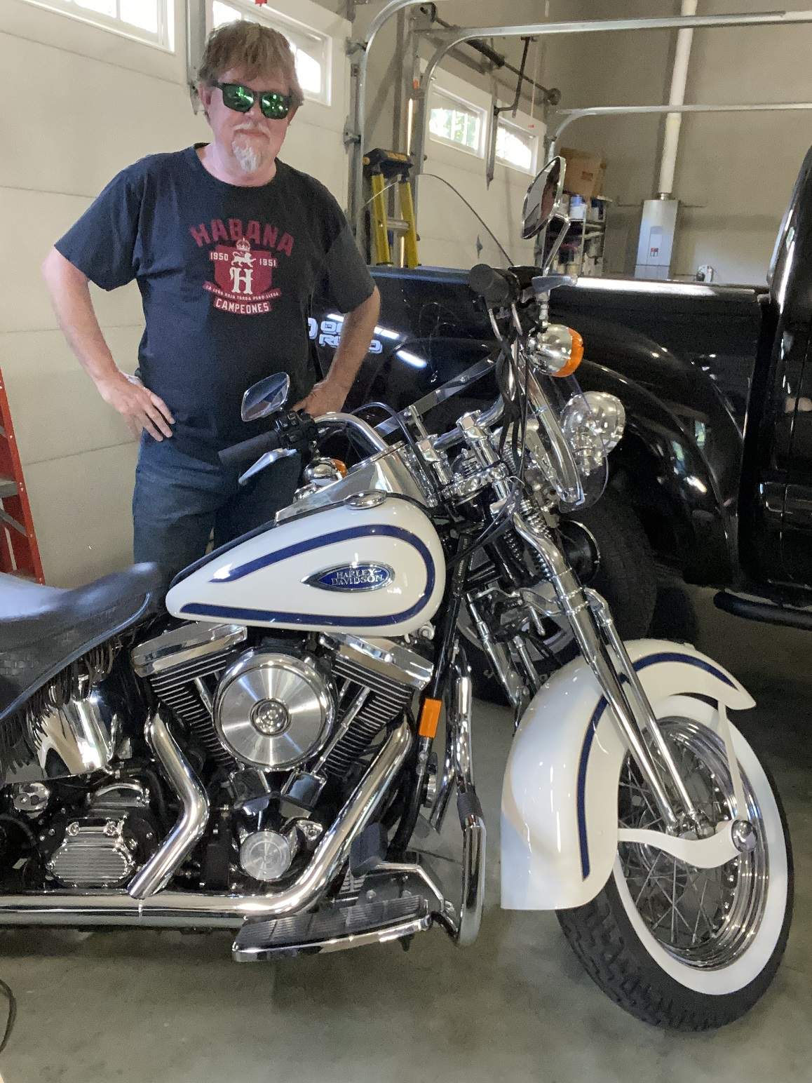 Greg with his old Harley in a humidity controlled garage