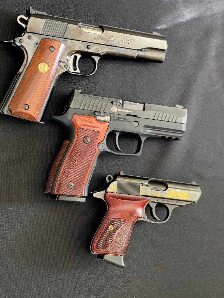 Colt .45, Sig 9mm and Walther .380 for size comparison