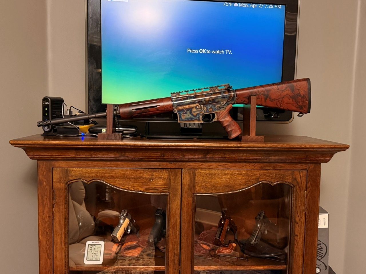 Turnbull TAR-40 shown on top of a wooden gun cabinet