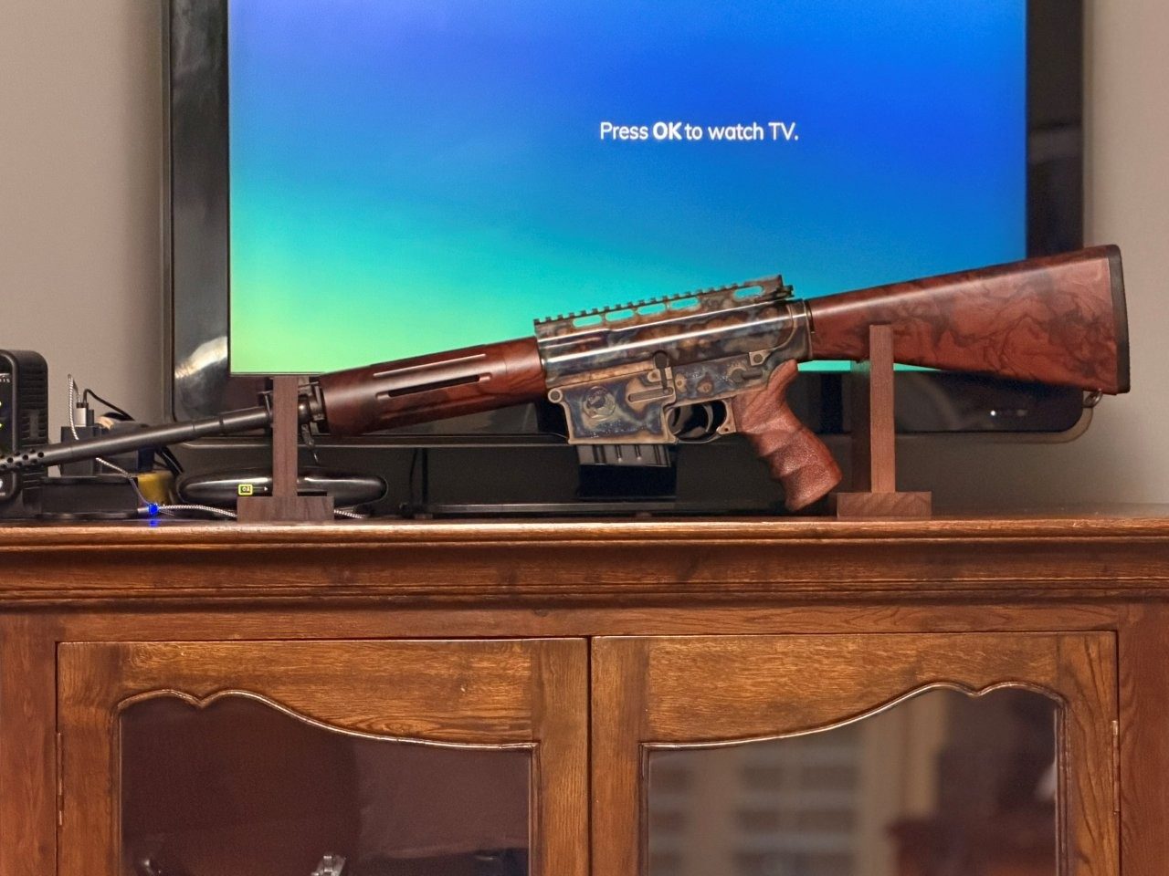 Turnbull TAR-40 displayed on a wood stand in front of a television