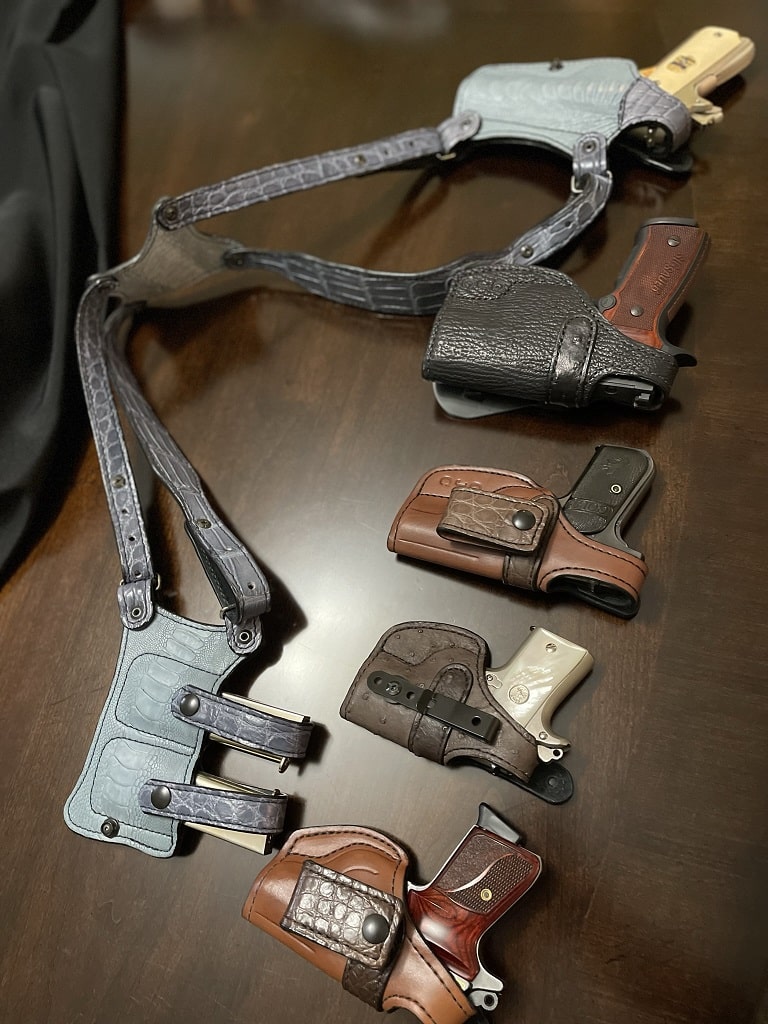 Five different holsters custom made for me by The Southern Trapper