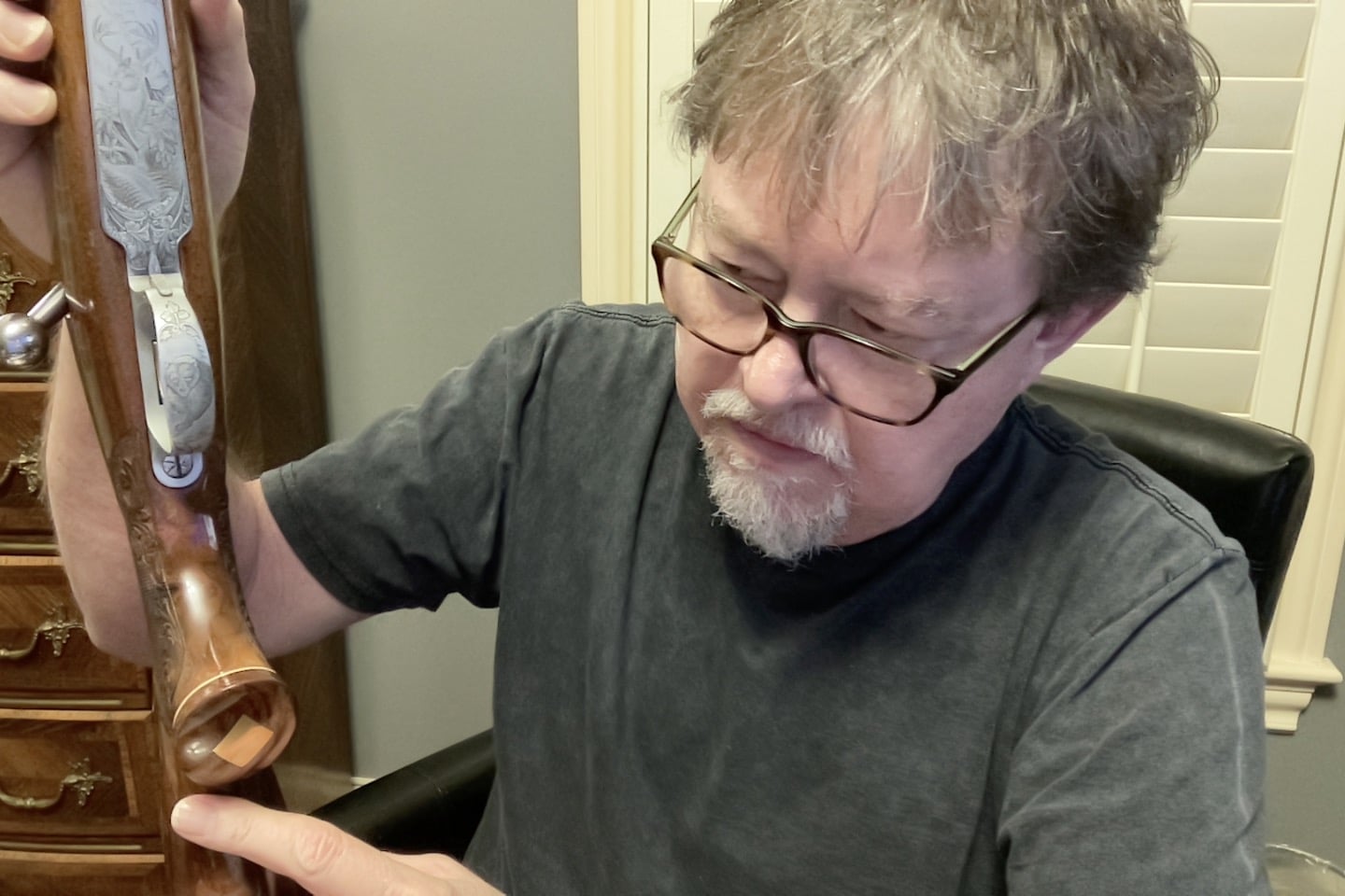 Author inspecting the Browning Rifle