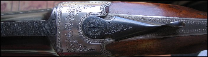 Abercrombie and Fitch 12 gauge shotgun, close up of forearm
