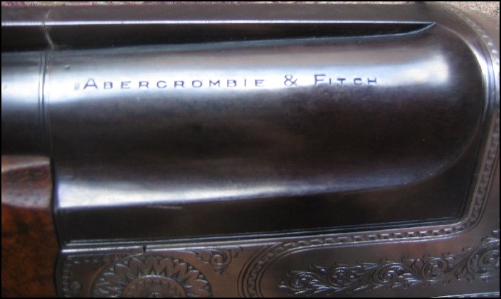 Abercrombie and Fitch 12 gauge shotgun, close up of forearm