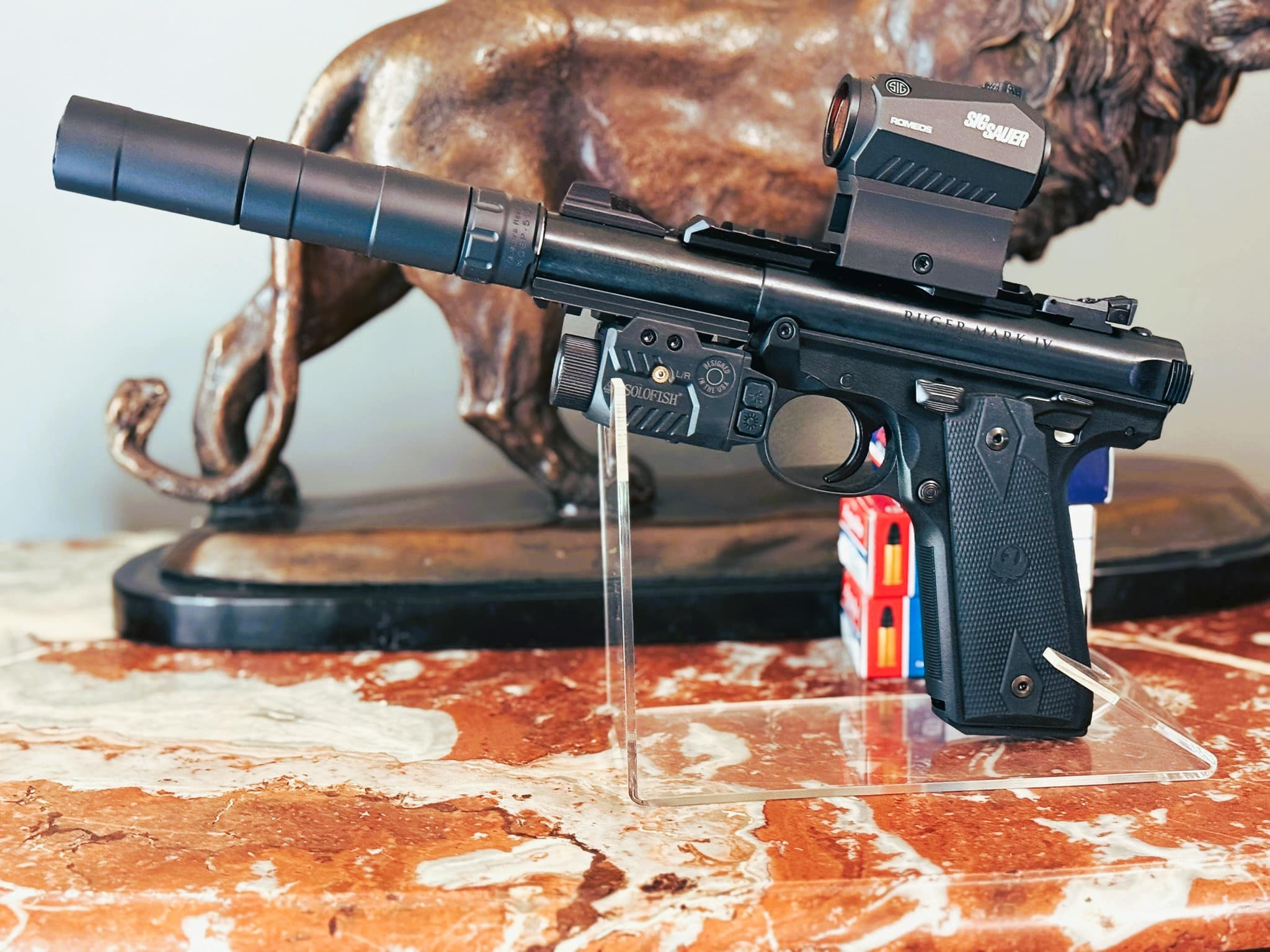 Solofish light laser combo shown with handgun for review