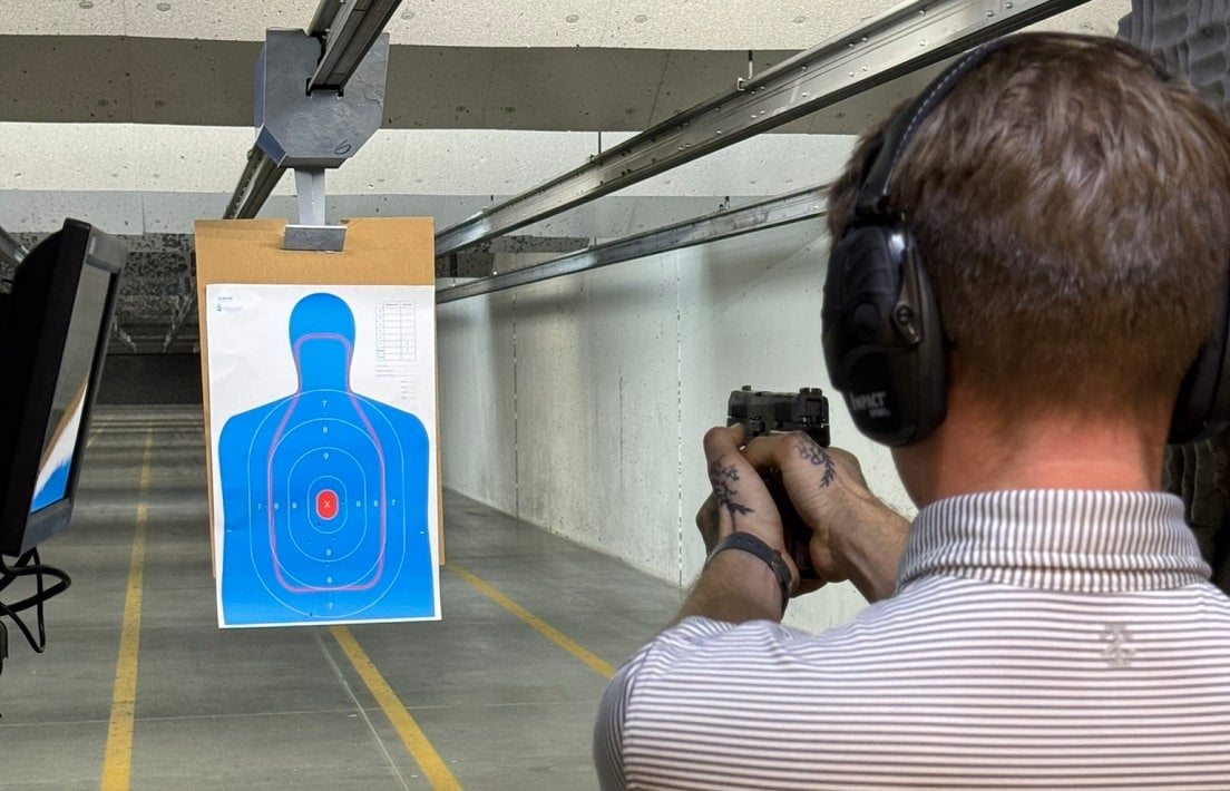 Alec firing at the gun range