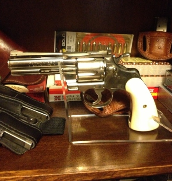 Colt Python in gun cabinet