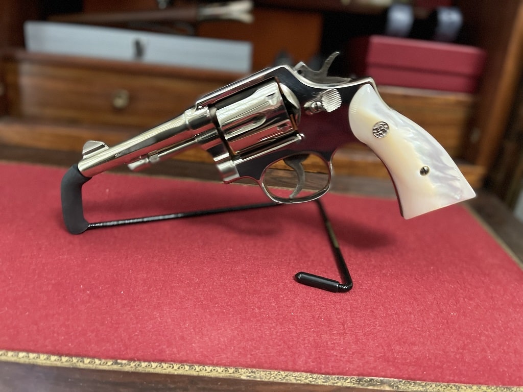 The S&W Model 10 wearing real Mother-Of-Pearl grips