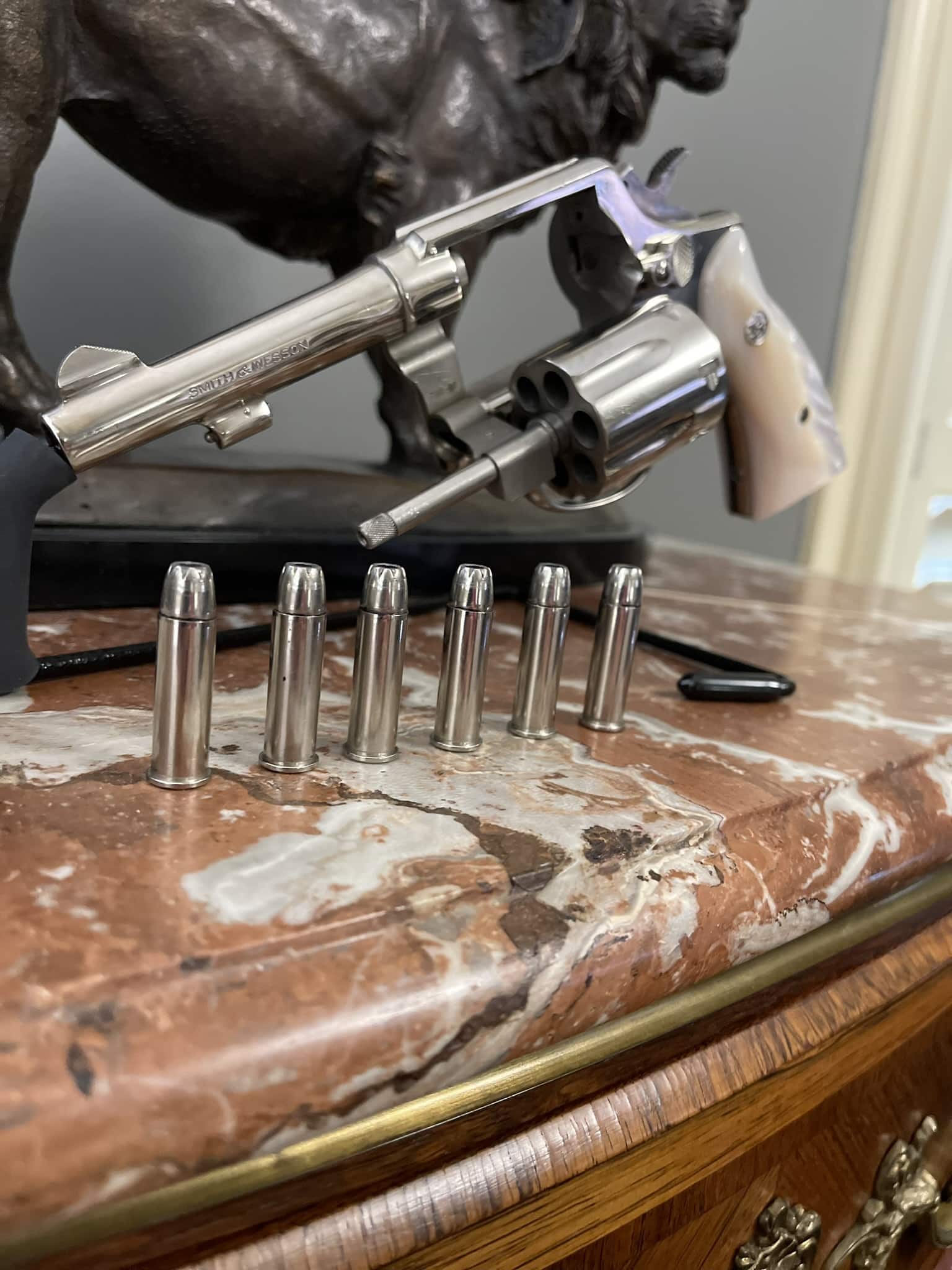 Smith & Wesson Model 10 revolver displayed with .38 Special cartridges