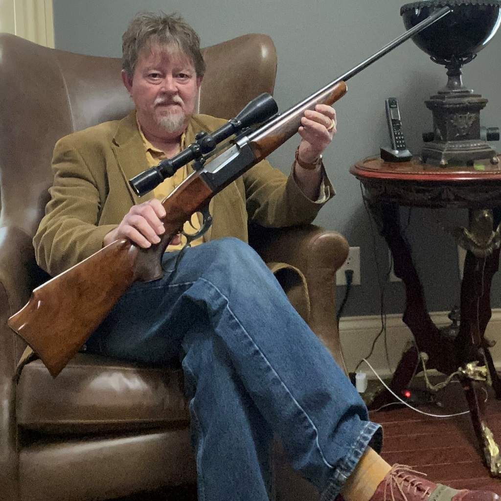 Author with his Savage Model 99