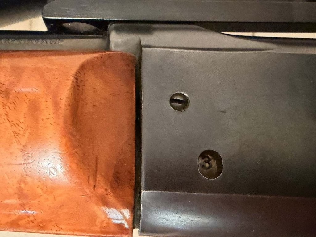 Savage Model 99 rotary magazine cartridge counter showing the number five