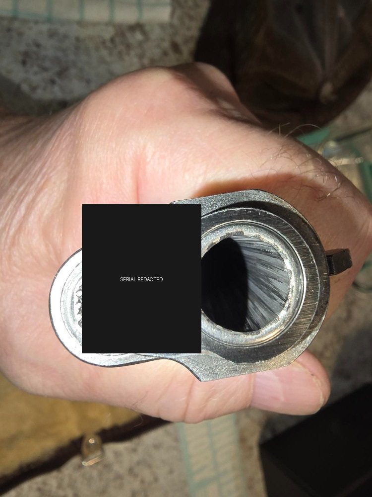 Second view of fitted bushing face with identifying digits covered
