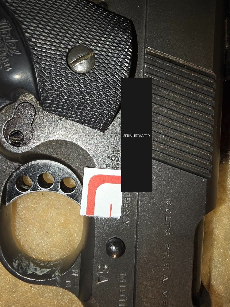 Paper cover placed over identifying number on the Taylor Colt