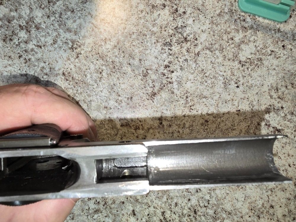 Interior surfaces of Taylor Colt slide showing fitted working areas