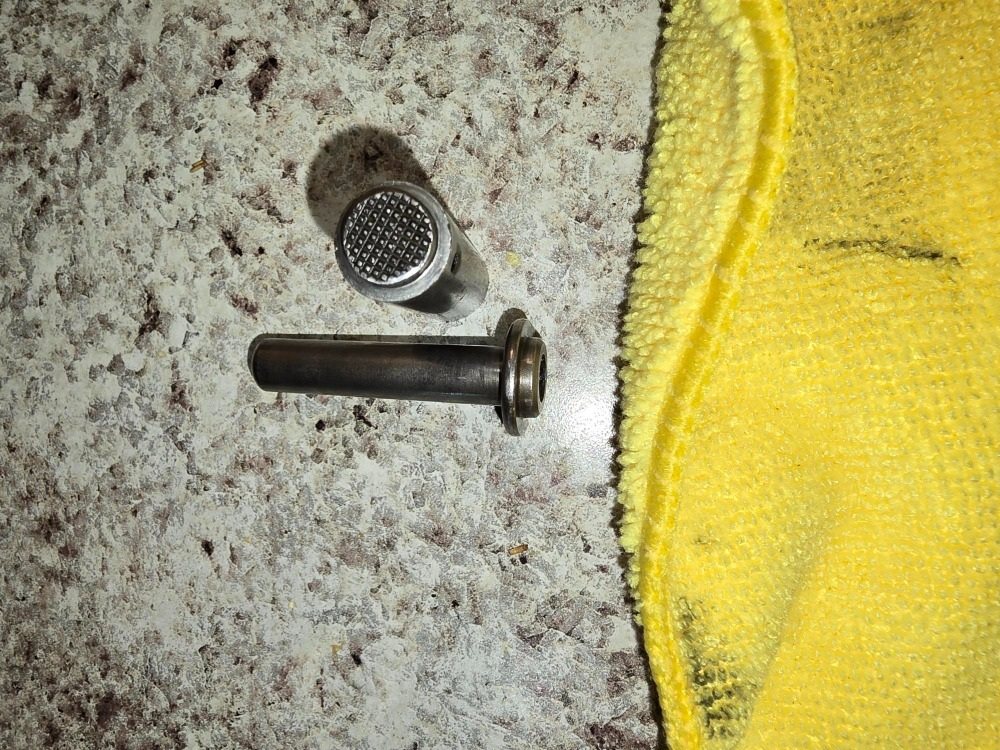 Small fitted pistol components photographed separately