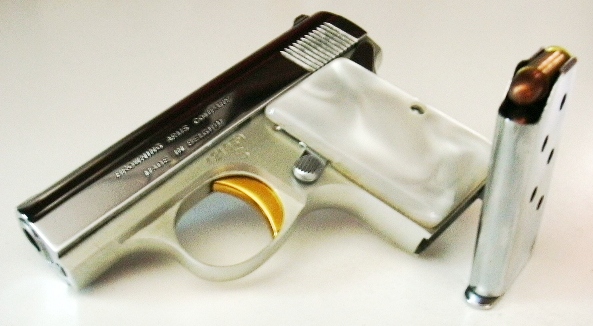 1968 Browning .25 caliber pistol with loaded magazine removed