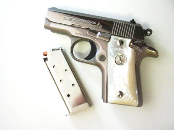 Colt Mustang .380 with loaded magazine removed