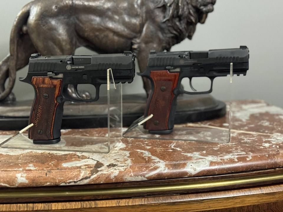 two identical Sig Sauer AXG Classic P320 TALO Exclusive handguns