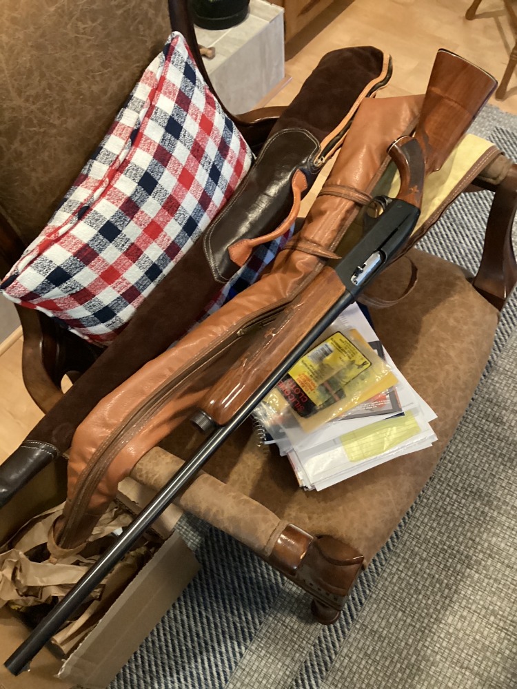 Gary McLain’s Remington Model 1100 resting on soft gun cases