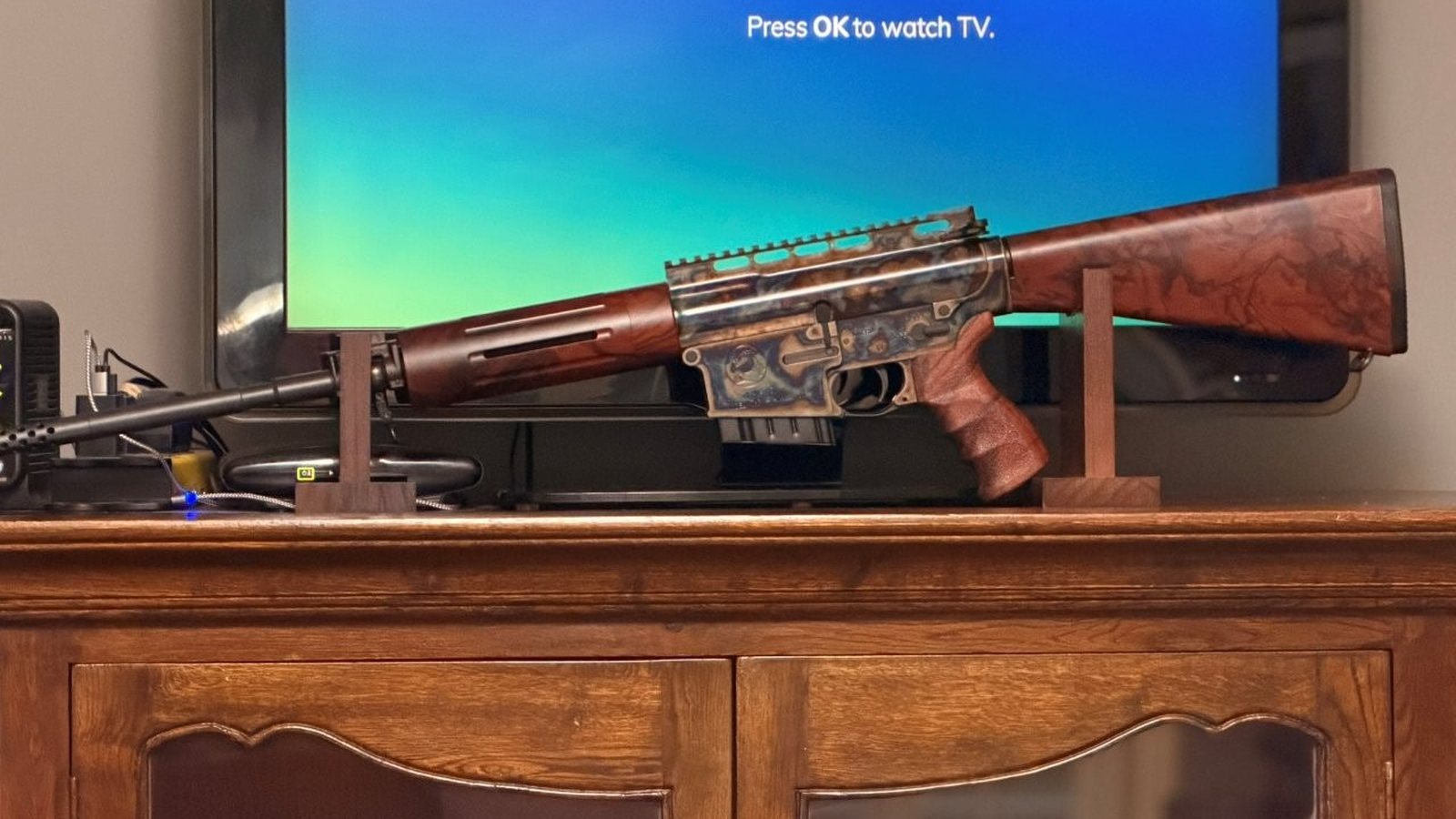 Turnbull TAR-40 displayed on a wood rifle stand
